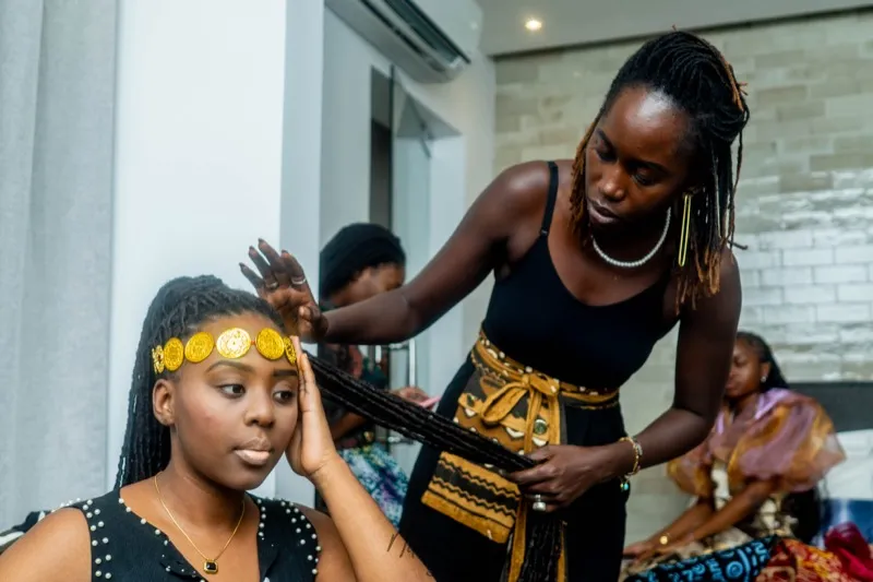 Diama styling model with gold headpiece at fitting